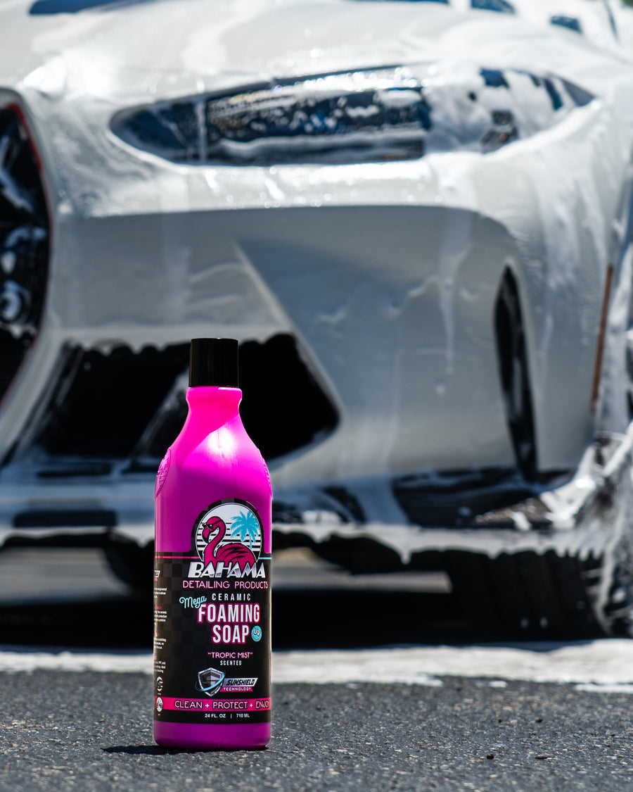 Bahama Mega Foaming Soap bottle beside a foamed sports car