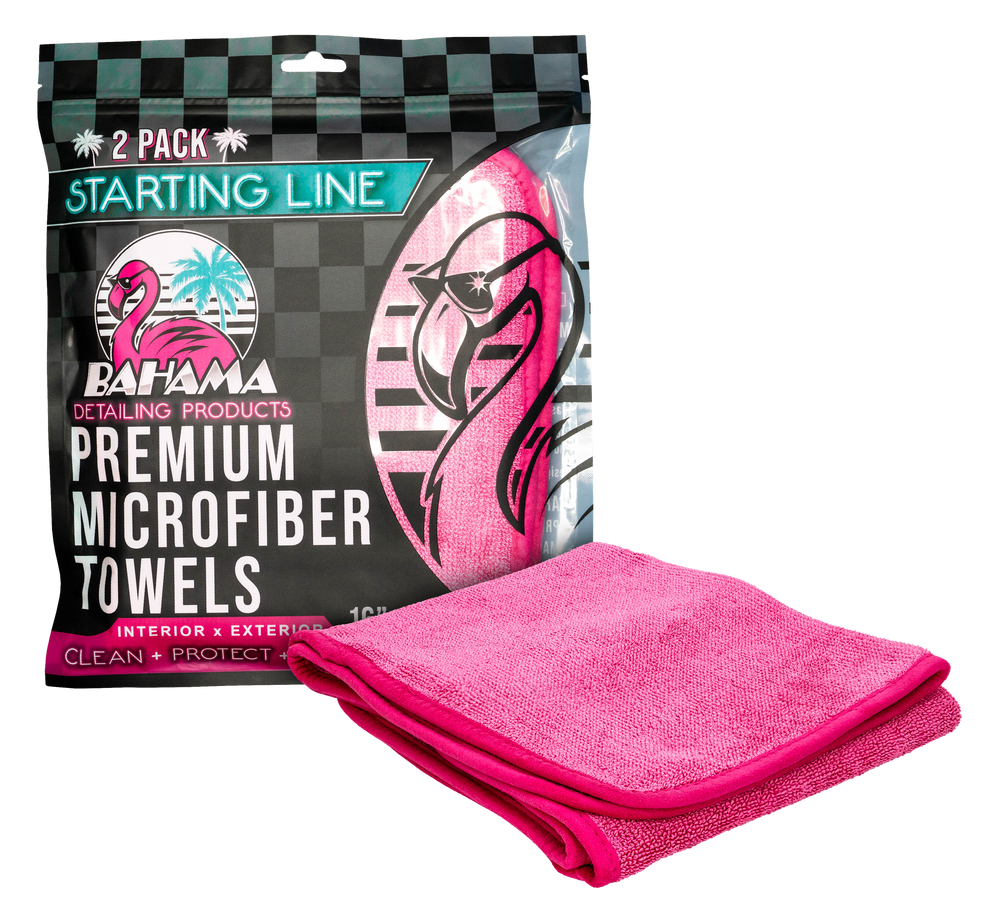 Starting Line pack beside a folded pink 550 GSM microfiber towel